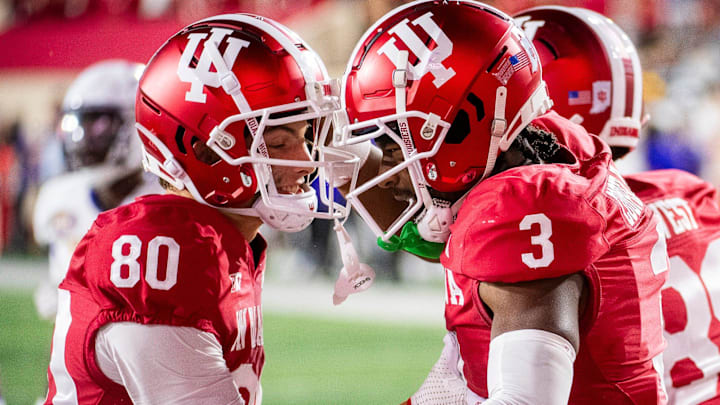 Indiana's Omar Cooper Jr. (3) celebrates with Charlie Becker (80) during the Indiana versus Western Illinois football game at Memorial Stadium on Friday, Sept. 6, 2024.