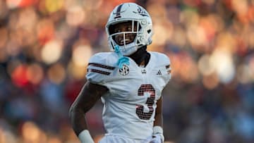 Former Mississippi State Bulldog wide receiver Kevin Coleman Jr. (3) smiles after scoring a touchdown in a game against the Mississippi Rebels last season.