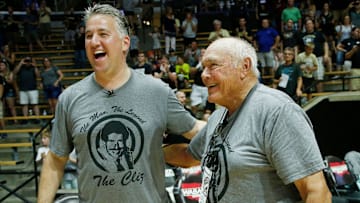 Gold team coach Matt Painter shares a laugh with Gene Keady