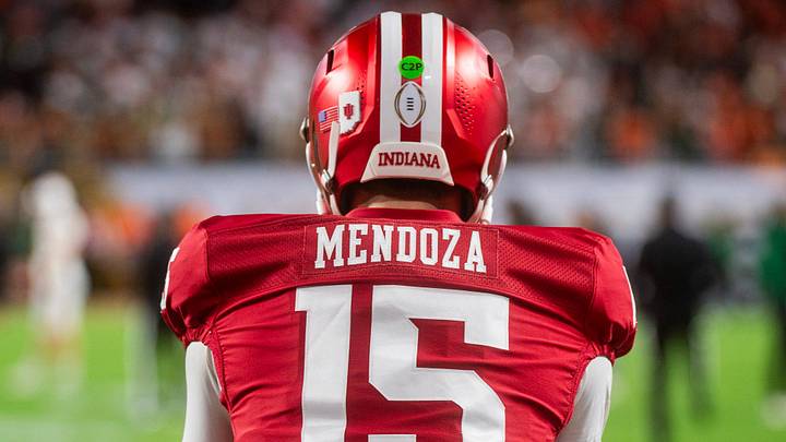 Indiana's Fernando Mendoza (15) gets loose before the College Football Playoff National Championship college football game at Hard Rock Stadium in Miami Gardens on Monday, Jan. 19, 2026.