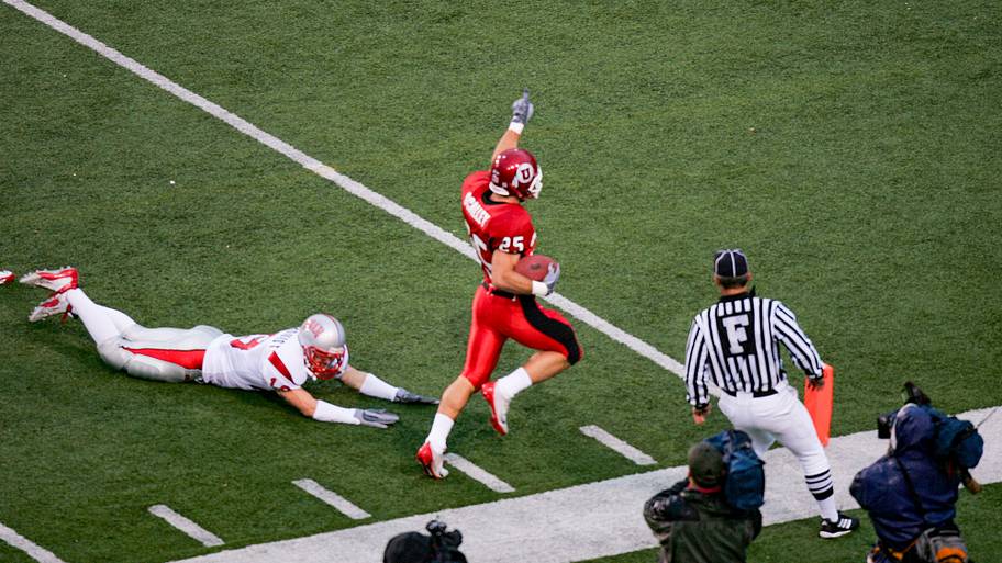 Utah defensive back Morgan Scalley returns an kick for a touchdown.