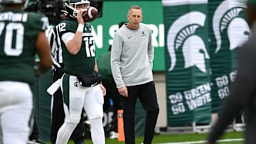 Michigan State's offensive coordinator Jay Johnson works with quarterback before the football game against Rutgers on Saturday, Nov. 12, 2022, in East Lansing.

221112 Msu Rutgers Fb 038a