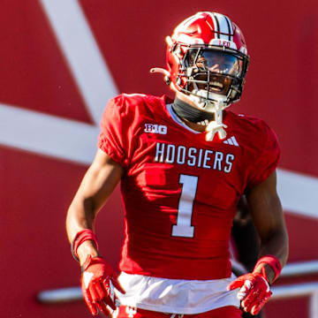 Indiana's Donaven McCulley (1) celebrates a long gain against Michigan State at Memorial Stadium.