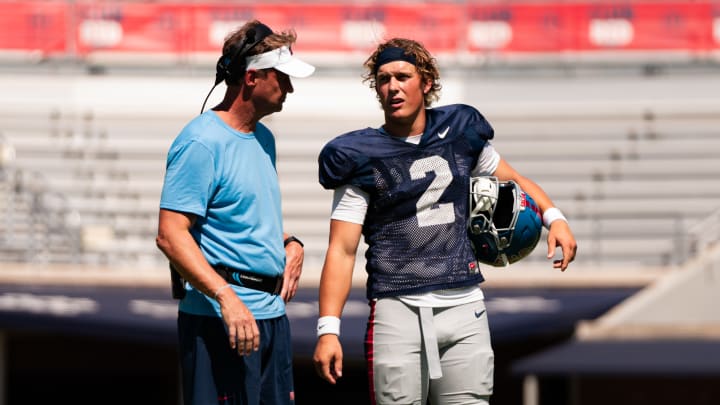 Ole Miss Rebels head coach Lane Kiffin (left) and quarterback Jaxson Dart at the team's first scrimmage of fall camp.