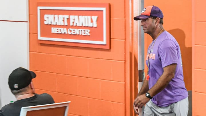 Clemson head coach Dabo Swinney walks in before talking with media in the Smart Family Media Center in Clemson, Tuesday, August 6, 2024.