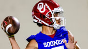 Quarterback Nick Evers (7) throws a pass during the University of Oklahoma's Spring football session