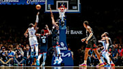 Williams goes up for a shot against the Rockets.