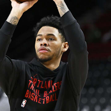 Mar 11, 2024; Portland, Oregon, USA; Portland Trail Blazers guard Anfernee Simons (1) warms up before a game against the Boston Celtics at Moda Center. Mandatory Credit: Troy Wayrynen-Imagn Images