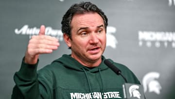 Michigan State coach Jonathan Smith talks the media on the first national signing day for college