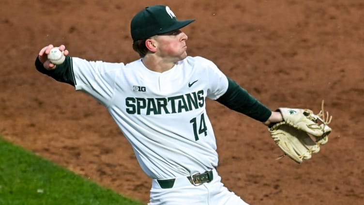 Michigan State's Mitch Jebb fields a ball hit by Michigan during the sixth inning on Friday, April 15, 2022, at Jackson Field in Lansing.

220415 Msu Mich Baseball 121a