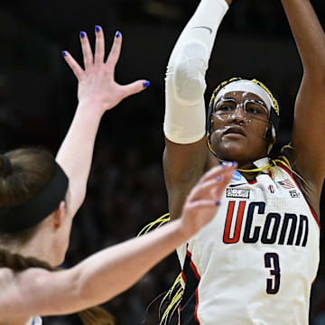 Mar 30, 2024; Portland, OR, USA; UConn Huskies forward Aaliyah Edwards (3) shoots a jump shot during the first half against Duke Blue Devils center Kennedy Brown (42) in the semifinals of the Portland Regional of the 2024 NCAA Tournament at the Moda Center. Mandatory Credit: Troy Wayrynen-Imagn Images
