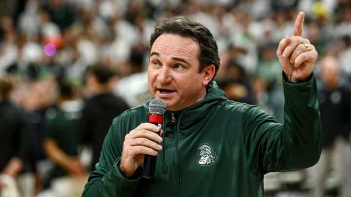 Michigan State's new football coach Jonathan Smith speaks to the crowd during a timeout in the basketball game against Georgia Southern on Tuesday, Nov. 28, 2023, at the Breslin Center in East Lansing.