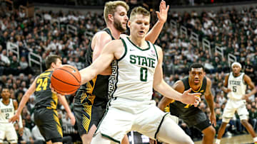 Michigan State's Jaxon Kohler moves the ball against Iowa during the first half on Tuesday, Feb. 20,