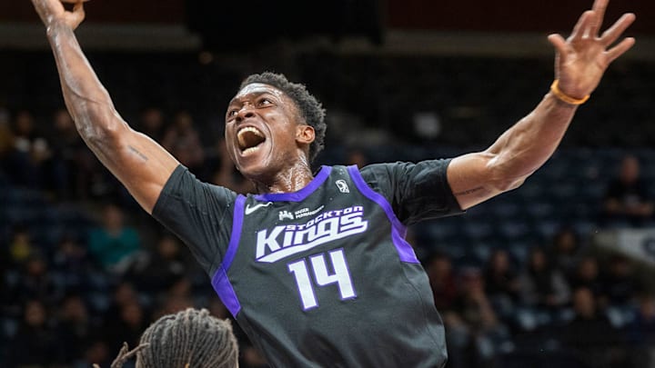 The Stockton Kings' Stanley Johnson, right, drives on Santa Cruz Warriors' Yuri Collins during an NBA G League playoff game at the Adventist Health arena in downtown Stockton on Apr. 4, 2024.