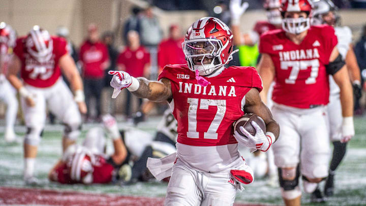 Indiana's Ty Son Lawton (17) celebrates a touchdown during the Indiana versus Purdue football game at Memorial Stadium on Saturday, Nov. 30, 2024. Indiana's Ty Son Lawton (17) celebrates a touchdown during the Indiana versus Purdue football game at Memorial Stadium on Saturday, Nov. 30, 2024.