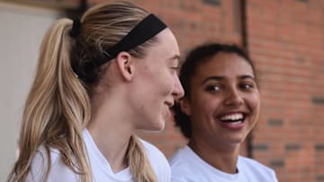 October 19, 2021: Connecticut sophomore Paige Bueckers, left, shares a laugh with freshman Azzi Fudd at a news conference on Tuesday, Oct. 19, 2021.