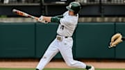 Michigan State's Mitch Jebb gets a hit against Purdue Fort Wayne during the first inning on Wednesday, April 19, 2023, at the McLane Baseball Stadium in East Lansing Mall.

230419 Msu Purdue Fw Baseball 011a