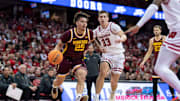 Gophers guard Lu'Cye Patterson drives against the Wisconsin Badgers. 