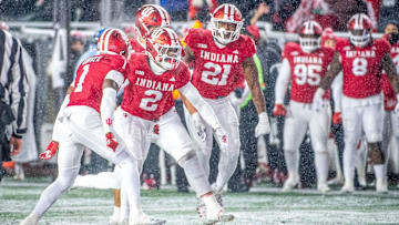 Indiana's Jalin Walker (2) and the Hoosier celebrate his interception during the Indiana versus Purdue football game at Memorial Stadium on Saturday, Nov. 30, 2024.