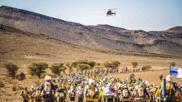  A picture of runners in the Sahara desert