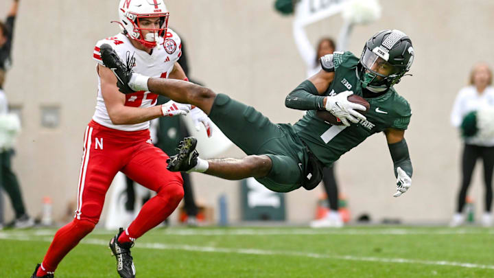 Michigan State's Jaden Mangham intercepts a Nebraska pass during the first quarter on Saturday, Nov. 4, 2023, at Spartan Stadium in East Lansing.