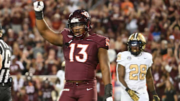 Sep 6, 2025; Blacksburg, Va.; Virginia Tech defensive lineman Kemari Copeland (13) celebrates a defensive stop against Vanderbilt.