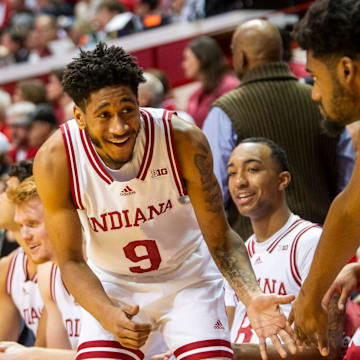 Indiana's Kanaan Carlyle (9) smiles as he exits the game during the Indiana versus Minnesota men's basketball game at Simon Skjodt Assembly Hall on Monday, Dec. 9, 2024.