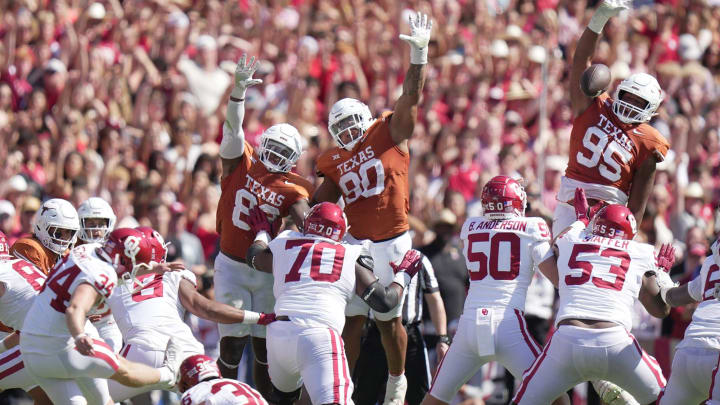 Texas Longhorns defensive lineman Alfred Collins (95) blacks the flied goal late in the fourth quarter against Oklahoma Soonersduring an NCAA college football game at the Cotton Bowl on Saturday, Oct. 7, 2023 in Dallas, Texas. This game makes up the119th rivalry match up.