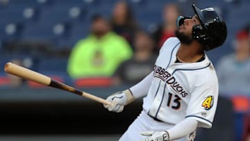 Akron RubberDucks outfielder George Valera (13) watches his shot during the third inning of a Minor League Baseball game at Canal Park on Tuesday.