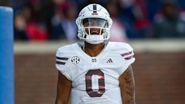 Mississippi State's quarterback Michael Van Buren Jr. (0) celebrates scoring a touchdown during the Egg Bowl game against Mississippi at Vaught-Hemingway Stadium on Friday, Nov. 29, 2024.