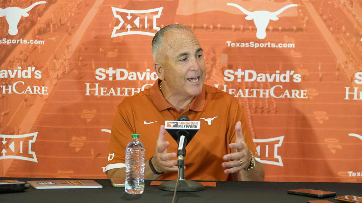 Longhorns Offensive coordinator Kyle Flood answer questions from the local news media during the first press conferences for the 2023 football season on August 1, 2023.