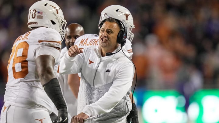 Nov 11, 2023; Fort Worth, Texas, USA; Texas Longhorns head coach Steve Sarkisian congratulates Texas Longhorns offensive lineman Kelvin Banks Jr. (78) after a score in the first quarter of an NCAA college football game at Amon G. Carter Stadium. Mandatory Credit: Ricardo B. Brazziell-USA TODAY Sports