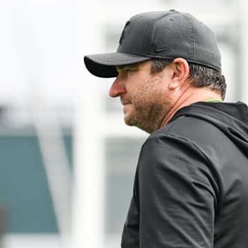 Michigan State University football coach Jonathon Smith observes his Spartan gridders, Tuesday, July 29, 2025, during the first day of football practice at the Skandalaris Football Center.