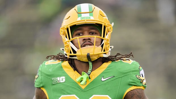 USA; Oregon Ducks running back Jordan James (20) warms up before a game against the Maryland Terrapins at Autzen Stadium. Man
