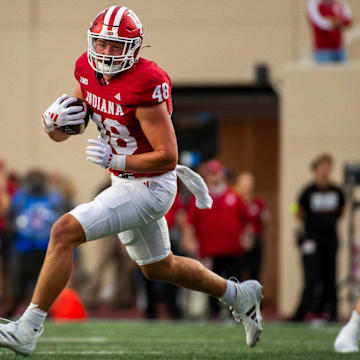 Indiana tight end James Bomba (48) runs after the catch against Western Illinois at Memorial Stadium.