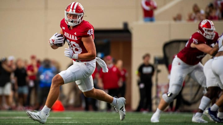 Indiana tight end James Bomba (48) runs after the catch against Western Illinois at Memorial Stadium.