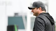 Michigan State University football coach Jonathon Smith observes his Spartan gridders, Tuesday, July 29, 2025, during the first day of football practice at the Skandalaris Football Center.