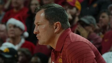 Iowa State Cyclones men's basketball head coach T.J. Otzelberger watches from bench against Iowa during the first half in the men’s basketball Cy-Hawk series on Dec. 11, 2025, in Ames, Iowa.