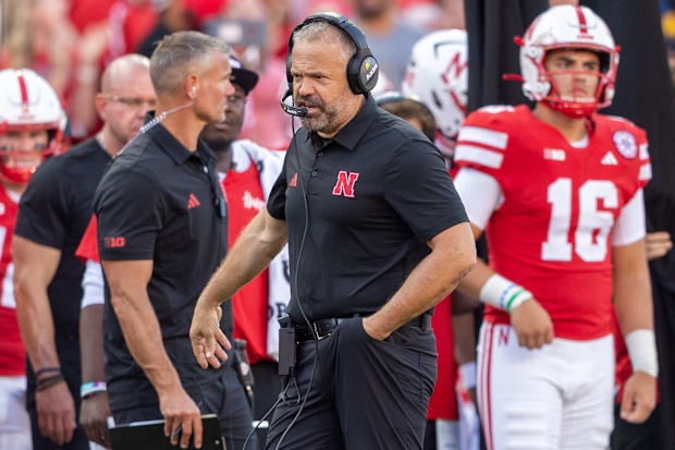 Nebraska coach Matt Rhule patrols the sideline against Michigan.