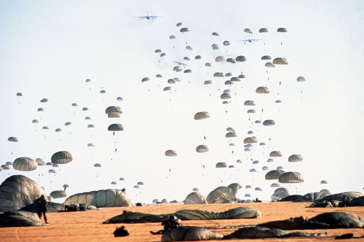 Members of the 82nd Airborne Division land
