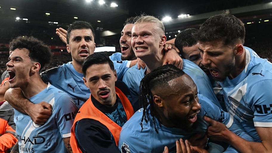 Man City players celebrate.