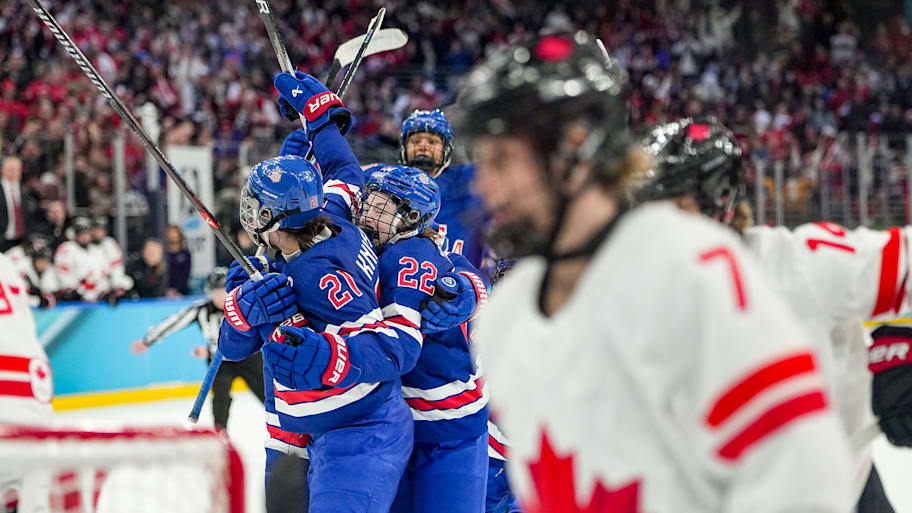 Team USA celebrates Hilary Knight's game-tying goal against Canada in the gold medal game at the Milan Coritna Olympics.