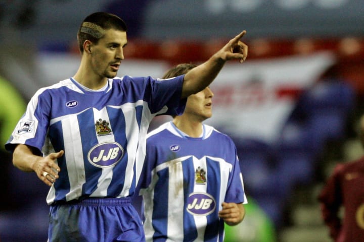 Wigan Athletic's Paul Scharner celebrate