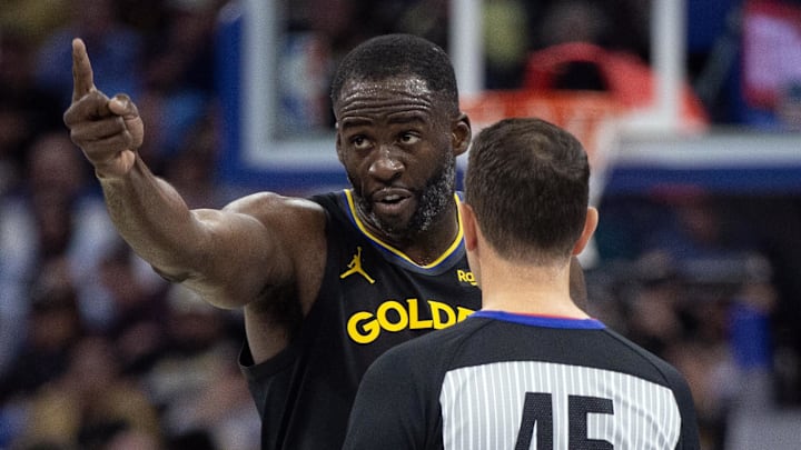 Golden State Warriors forward Green argues a call with referee in a game against the Memphis Grizzlies.