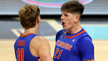(10) Thomas Haugh and (21) Alex Condon celebrate against Auburn