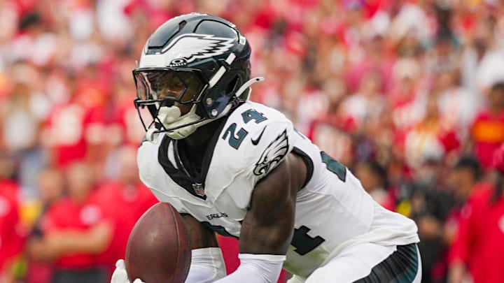 Sep 14, 2025; Kansas City, Missouri, USA; Philadelphia Eagles safety Andrew Mukuba (24) intercepts a pass during the second half against the Kansas City Chiefs at GEHA Field at Arrowhead Stadium. Mandatory Credit: Jay Biggerstaff-Imagn Images