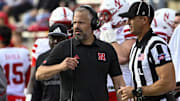 Oct 11, 2025; College Park, Maryland, USA;  Nebraska Cornhuskers head coach Matt Rhule walks the sidelines during the game against the Maryland Terrapins at SECU Stadium. Mandatory Credit: Tommy Gilligan-Imagn Images