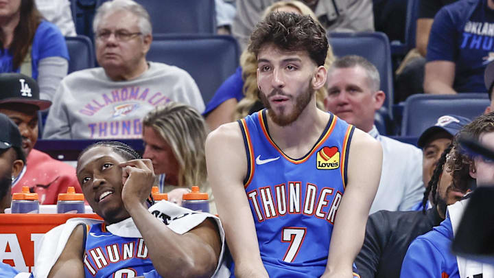 Apr 10, 2024; Oklahoma City, Oklahoma, USA; (L-R) Oklahoma City Thunder guard Isaiah Joe (11) and forward Jaylin Williams (6) and guard Shai Gilgeous-Alexander (2) and forward Jalen Williams (8) and forward Chet Holmgren (7) watch their team play against the San Antonio Spurs during the second half at Paycom Center. Mandatory Credit: Alonzo Adams-Imagn Images