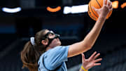 North Carolina Tar Heels forward Ciera Toomey (21) goes up for a layup during practice before their Sweet 16 matchup with Duke at Legacy Arena in Birmingham, Ala., on Thursday, March 27, 2025.