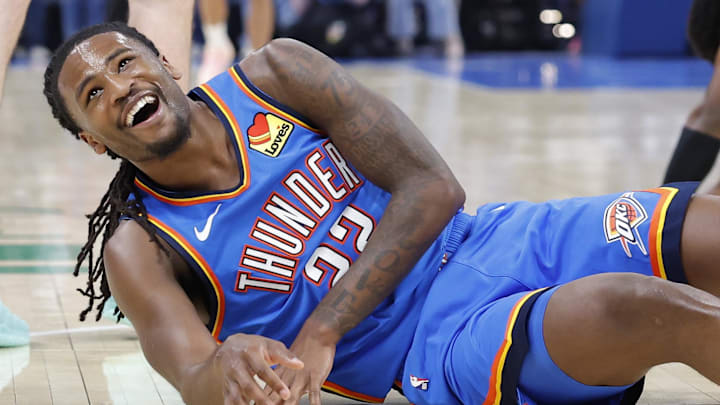 Apr 2, 2026; Oklahoma City, Oklahoma, USA; Oklahoma City Thunder guard Cason Wallace (22) laughs after a diving play against the Los Angeles Lakers during the second half at Paycom Center. Mandatory Credit: Alonzo Adams-Imagn Images